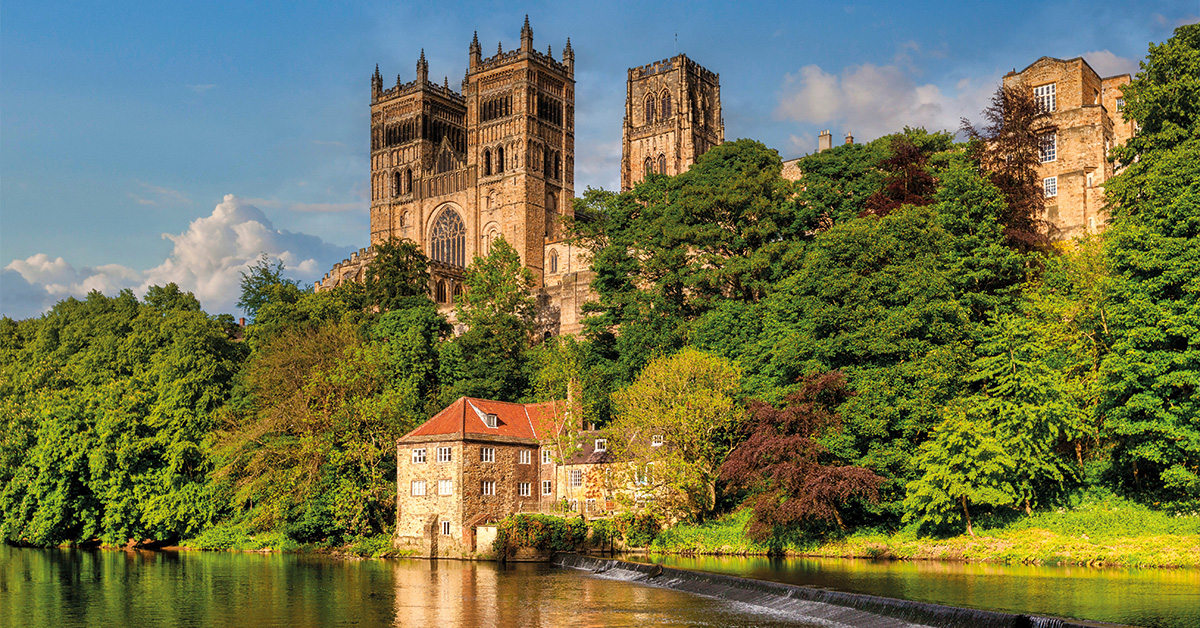 Durham Cathedral and the Old Fulling Mill, on the banks of the River Wear, on a sunny spring day, County Durham, UK