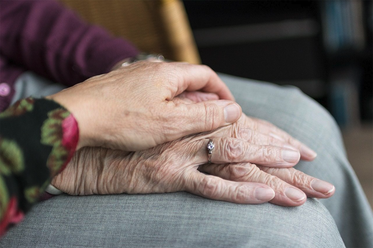 Screenshot 2026-07-14 at 10.26.35 Photo of people holding hands tenderly